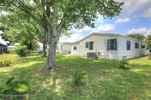 714 Amaryllis Dr, Barefoot Bay, FL 32976 - Photo 2