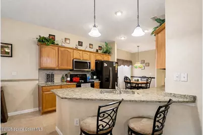 6973 Premonition Drive, Melbourne, FL 32940 - Photo 18