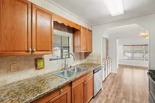 637 Wedelia Dr, Barefoot Bay, FL 32976 - Photo 8