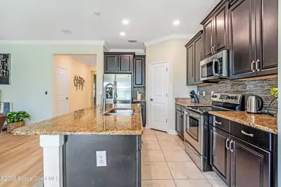 9923 Magnolia Woods Boulevard, Orlando, FL 32832 - Photo 8