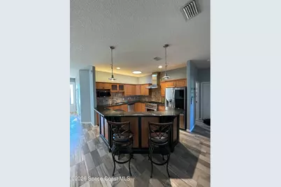 2542 Woodfield Circle, Melbourne, NC 32904 - Photo 4