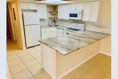 1648 Sunny Brook Lane NE #M202, Palm Bay, FL 32905 - Photo 2