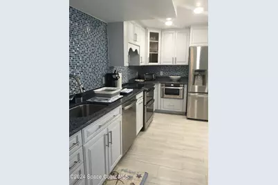 3613 S Banana River Boulevard #304, Cocoa Beach, FL 32931 - Photo 2