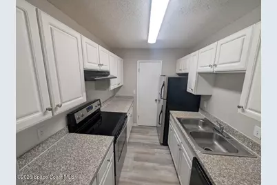 3506 Sable Palm Lane #E, Titusville, FL 32780 - Photo 8