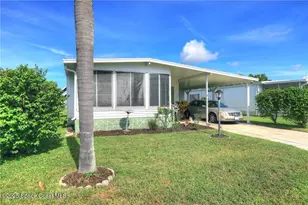 912 Oriole Cir, Barefoot Bay, FL 32976 - Photo 2