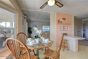 912 Oriole Cir, Barefoot Bay, FL 32976 - Photo 8