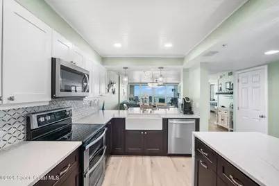 3740 Ocean Beach Boulevard #504, Cocoa Beach, FL 32931 - Photo 18