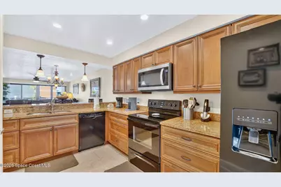 1050 N Atlantic Avenue #201, Cocoa Beach, FL 32931 - Photo 6