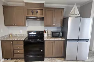 1184 Waterway Dr, Barefoot Bay, FL 32976 - Photo 8