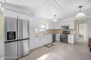 358 Dolphin Cir, Barefoot Bay, FL 32976 - Photo 14