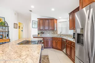 907 Yew St, Barefoot Bay, FL 32976 - Photo 16