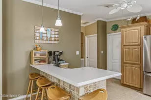 859 Tamarind Cir, Barefoot Bay, FL 32976 - Photo 10