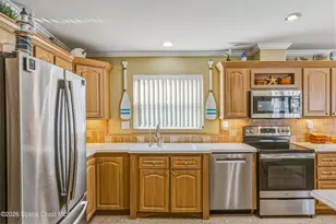 859 Tamarind Cir, Barefoot Bay, FL 32976 - Photo 12