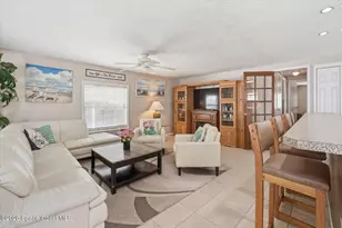 1027 Oriole Cir, Barefoot Bay, FL 32976 - Photo 10