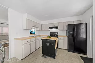 1103 Sabal Palm Ln, Barefoot Bay, FL 32976 - Photo 6