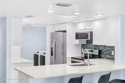 1595 N Atlantic Avenue #311, Cocoa Beach, FL 32931 - Photo 12