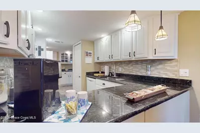 8711 Hibiscus Court, Cape Canaveral, FL 32920 - Photo 16