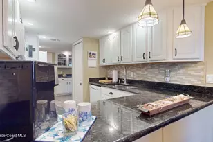 8711 Hibiscus Ct, Cape Canaveral, FL 32920 - Photo 16