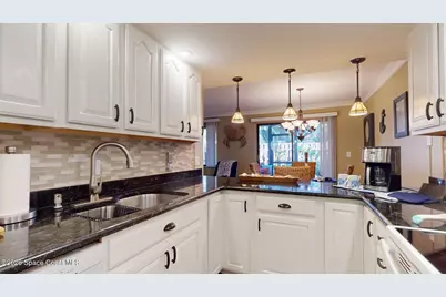 8711 Hibiscus Court, Cape Canaveral, FL 32920 - Photo 18