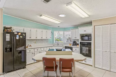 917 Cypress Street, Barefoot Bay, FL 32976 - Photo 12