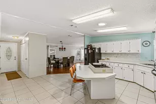 917 Cypress St, Barefoot Bay, FL 32976 - Photo 4