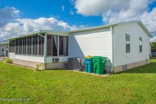 830 Lychee Dr, Barefoot Bay, FL 32976 - Photo 2