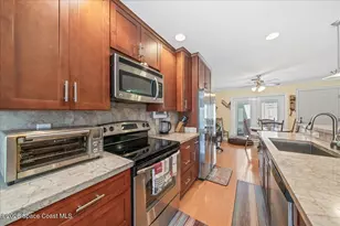 1412 Club Gardens Dr NE, Palm Bay, FL 32905 - Photo 12