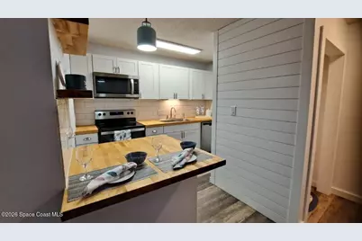 225 S Tropical Trail #203, Merritt Island, FL 32952 - Photo 6