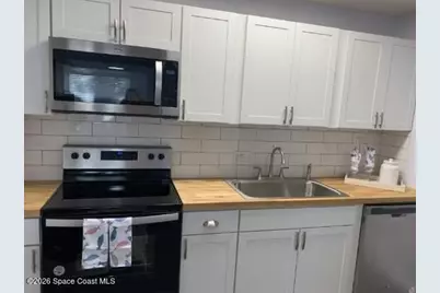 225 S Tropical Trail #203, Merritt Island, FL 32952 - Photo 4