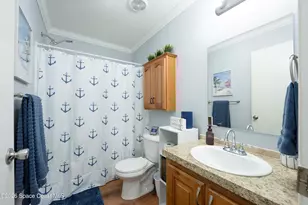 971 Laurel Cir, Barefoot Bay, FL 32976 - Photo 24