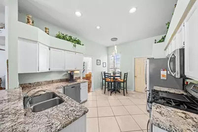 1044 Harbor Pines Drive, Merritt Island, FL 32952 - Photo 18