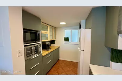 650 N Atlantic Avenue #406, Cocoa Beach, FL 32931 - Photo 12