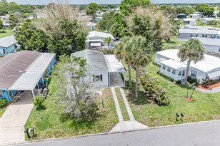 818 Thrush Cir, Barefoot Bay, FL 32976 - Photo 6