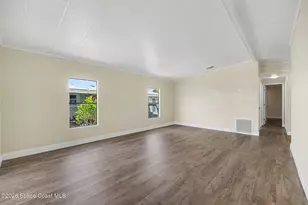 911 Hyacinth Cir, Barefoot Bay, FL 32976 - Photo 10