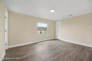 911 Hyacinth Cir, Barefoot Bay, FL 32976 - Photo 16