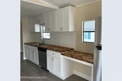 911 Hyacinth Circle, Barefoot Bay, FL 32976 - Photo 6