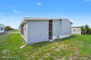 911 Hyacinth Cir, Barefoot Bay, FL 32976 - Photo 26