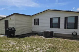 259 S Dolphin Cir, Barefoot Bay, FL 32976 - Photo 20