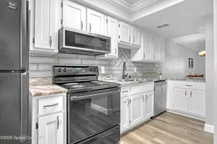 1010 Pine Tree Dr, Indian Harbour Beach, FL 32937 - Photo 22