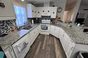 858 Pecan Cir, Barefoot Bay, FL 32976 - Photo 10