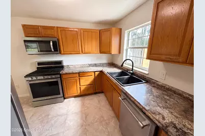1057 Lakemoor Boulevard, Rockledge, FL 32955 - Photo 12