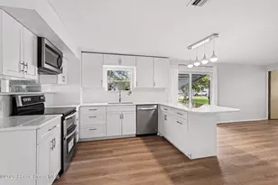 1043 Thrush Cir, Barefoot Bay, FL 32976 - Photo 8