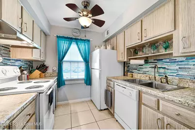 152 E East Colonial Court Court #84, Indian Harbour Beach, FL 32937 - Photo 10