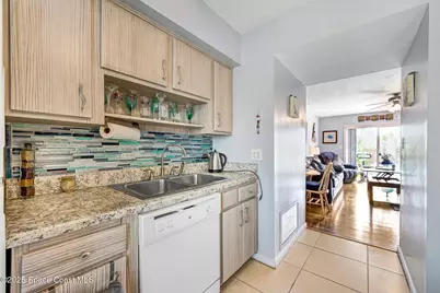 152 E East Colonial Court Court #84, Indian Harbour Beach, FL 32937 - Photo 12
