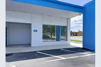 2555 N Courtenay Parkway #27, Merritt Island, FL 32953 - Photo 1