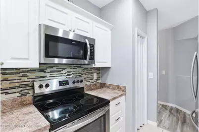 1045 Venetian Drive #102, Melbourne, FL 32904 - Photo 10