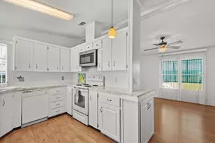836 Hyacinth Cir, Barefoot Bay, FL 32976 - Photo 12