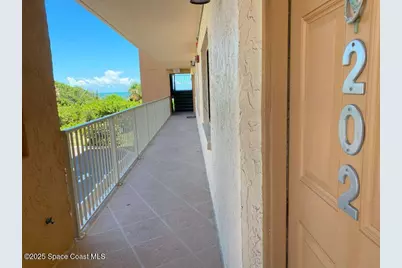 7520 Ridgewood Avenue #202, Cape Canaveral, FL 32920 - Photo 2