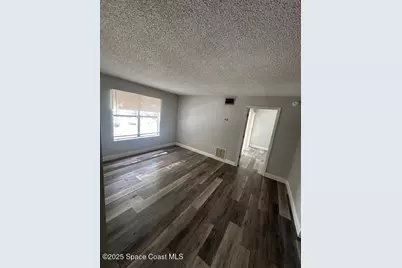 225 S Tropical Trail #205, Merritt Island, FL 32952 - Photo 2