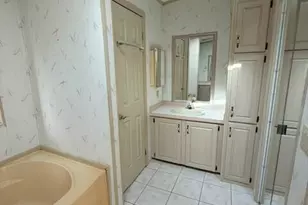 1202 Calusa Dr, Barefoot Bay, FL 32976 - Photo 12